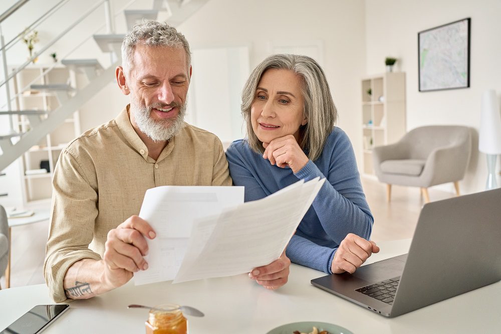 tips your financial advisor won't tell you - Middle aged couple